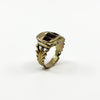 Angled profile of Georgian 9ct gold amethyst ring showing raised setting, shank detail and inner engraving