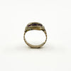 Side profile of antique 9ct gold amethyst trilogy ring with raised Georgian setting and visible band wear