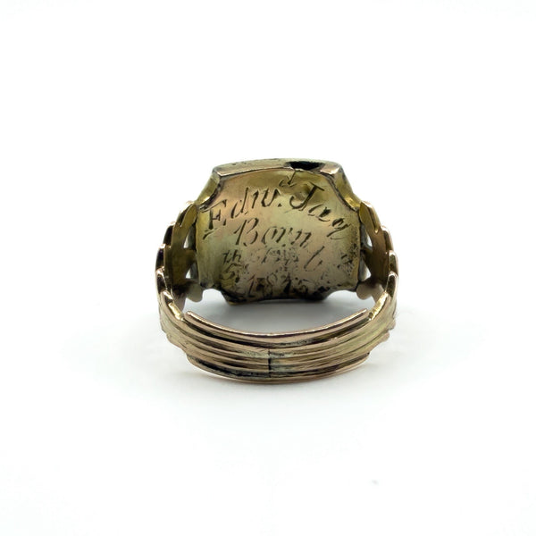 Close-up of engraved underside on antique Georgian 9ct gold amethyst ring with personal inscription visible