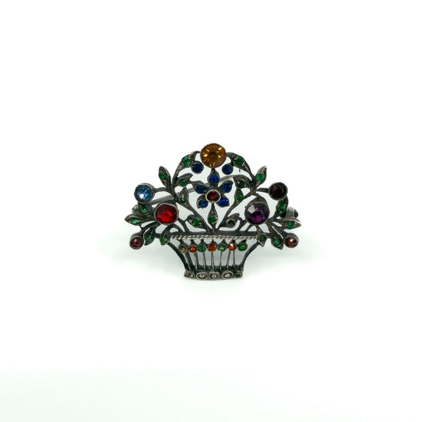 Antique sterling silver giardinetti brooch with marcasite and multicoloured paste stones in a floral basket design.
