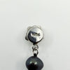 Close up of white gold filled clasp stamped 14/20L on black freshwater pearl necklace