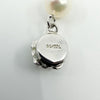 Close up of white gold filled lobster clasp stamped 14/20L on freshwater pearl necklace