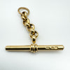 Close-up of 9ct gold T-bar pendant showing vintage belcher link and jump ring