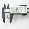 Digital caliper showing length of antique gold buckle charm at 19.5mm