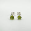 Front view of green CZ peridot stud earrings in sterling silver 925