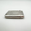 Close-up of hallmarks and shield engraving on 1912 Birmingham silver Vesta Case