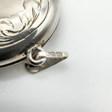 Close-up of Birmingham 1996 hallmarks on locket bail including 925 and maker's mark