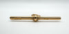 Close-up of 1909 Birmingham hallmarks on antique gold T-bar pendant