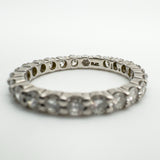 PLAT and Birmingham hallmarks visible inside diamond eternity band