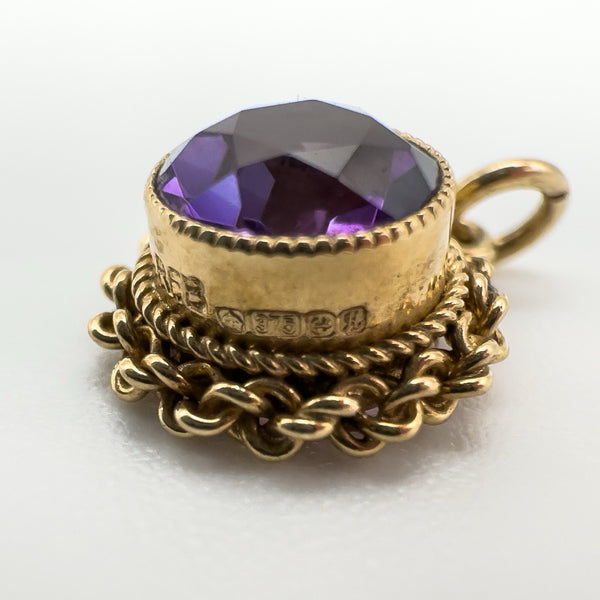 Close-up of hallmark on vintage 9ct gold amethyst pendant