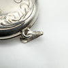 Engraved silver locket bail showing clear Birmingham silver hallmarks