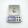 Modernist sterling silver wrap ring on digital scale showing weight of 11.1 grams