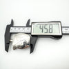 Digital caliper showing height of silver perfume bottle pendant as 45.8mm