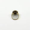Back view of vintage 18ct gold gemstone cluster ring showing the raised setting and open gallery