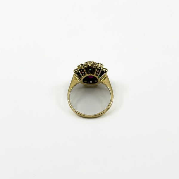 Back view of vintage 18ct gold gemstone cluster ring showing the raised setting and open gallery