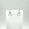 Mini sterling silver horseshoe earrings shown on white display