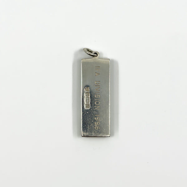 Back of the vintage sterling silver ingot pendant engraved IFA DIVISION 1996.