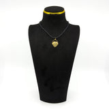 Vintage 9ct gold I Love You spinning fob pendant displayed on a black necklace stand