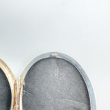 Inside of locket stamped 925 showing silver purity mark