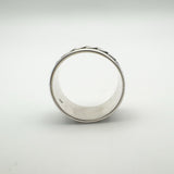  Interior of wide sterling silver ring showing curved band and hallmark