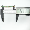 Caliper showing inner diameter of vintage bangle at 57.3mm
