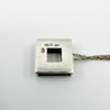 Back of Kit Heath sterling silver pendant showing KH 01 and 925 stamps