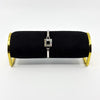 Vintage sterling silver Kit Heath mother of pearl bangle shown on a black bracelet display stand