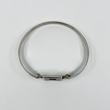 Back view of vintage Kit Heath sterling silver mother of pearl bangle with slim oval wrist shape