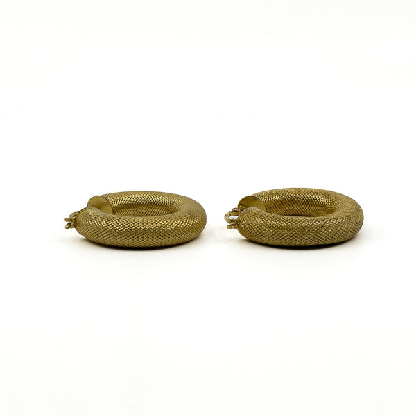 Large 9ct gold mesh hoop earrings shown from a low side profile view