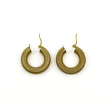 Pair of large vintage gold mesh hoop earrings showing textured finish and fittings