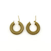 Pair of large vintage gold mesh hoop earrings showing textured finish and fittings