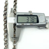 Calipers measuring the depth of the sterling silver Albert chain links (3.78mm shown).