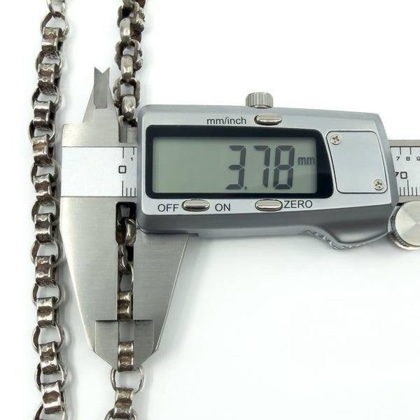 Calipers measuring the depth of the sterling silver Albert chain links (3.78mm shown).