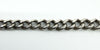 Close-up of the Albert chain links showing repeated lion passant stamps along the sterling silver links.