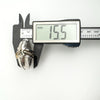 Side profile measurement of thick silver locket showing 15.5mm depth