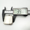 Antique silver vesta case height shown as 39.7mm on digital calipers