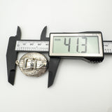 Sterling silver locket height shown as 41.3mm with digital calipers