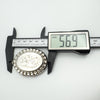 Caliper measuring height of large oval sterling silver locket at 56.9mm