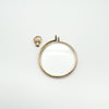 Screw-off bail removed to open antique locket for photo placement
