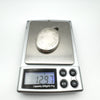 Foliate engraved sterling silver locket weighs 12.97 grams on digital scale