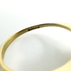 Close-up of London 1993 hallmarks and 750 mark inside the vintage 18ct gold gemstone ring band