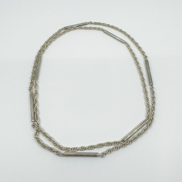Sterling silver necklace shown in looped position to highlight 34.5" length
