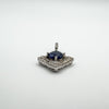 Blue CZ pendant with four-prong setting and white CZ halo