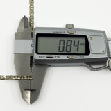 Digital caliper showing the link thickness on a vintage 9ct white gold mariner bracelet