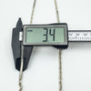 Digital caliper showing tubular link width as 3.4mm on sterling silver chain