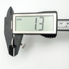 Digital calliper measuring the thickness of the cufflink at 1.3mm