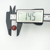 Digital caliper measuring carnelian ring head at 14.5mm wide