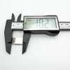Digital caliper showing notebook pendant length at 18.2mm