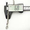 Digital caliper showing twisted silver link width at 6.8mm