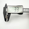 Digital caliper showing notebook pendant depth at 3.3mm